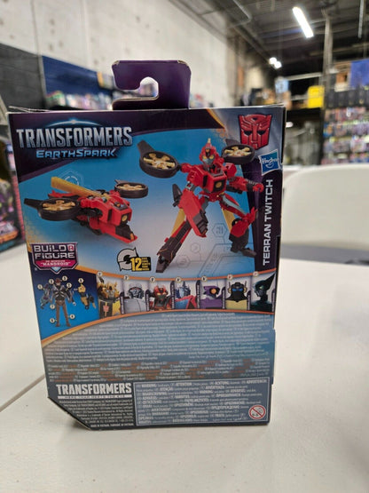 Transformers EarthSpark Terran Twitch Deluxe Class Hasbro 6" Figure BAF Mandroid